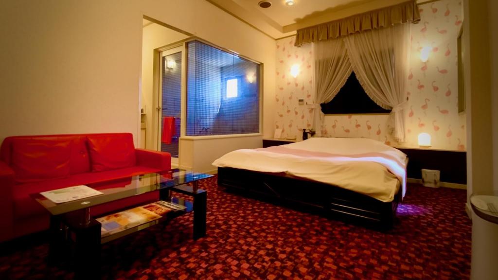 Postel nebo postele na pokoji v ubytování Hotel Sagano (Adult only)