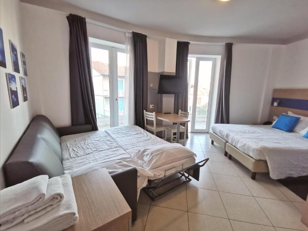 Postel nebo postele na pokoji v ubytování Hotel Oceanomare