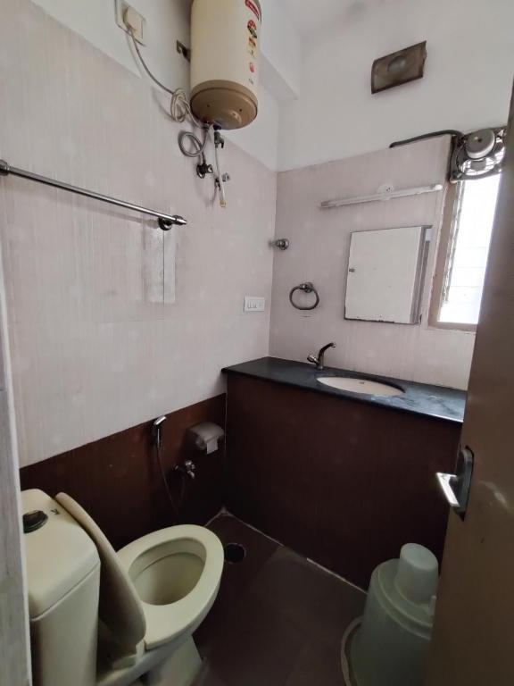 Koupelna v ubytování Swarna Sudarshan Service Apartments Sholinganallur