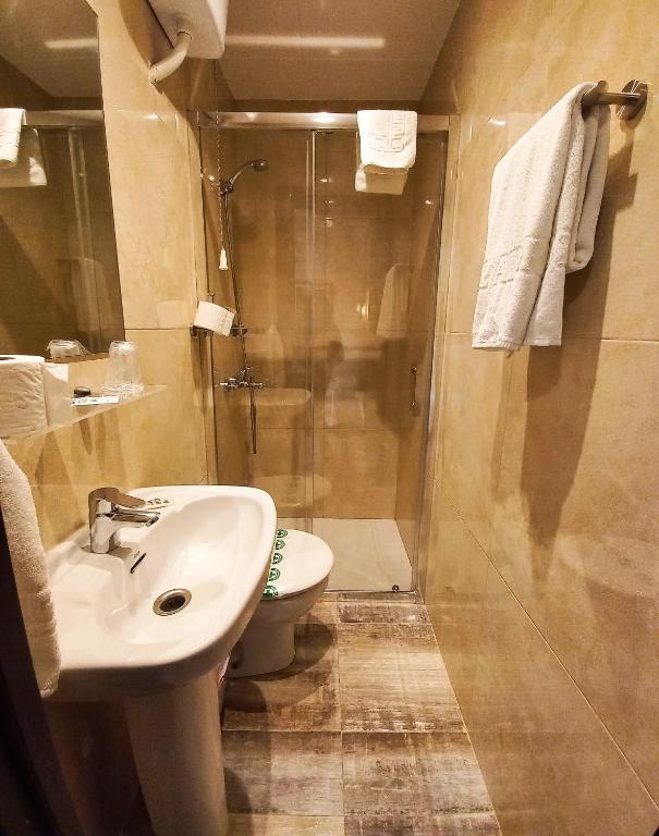 Koupelna v ubytování Hotel Alegret
