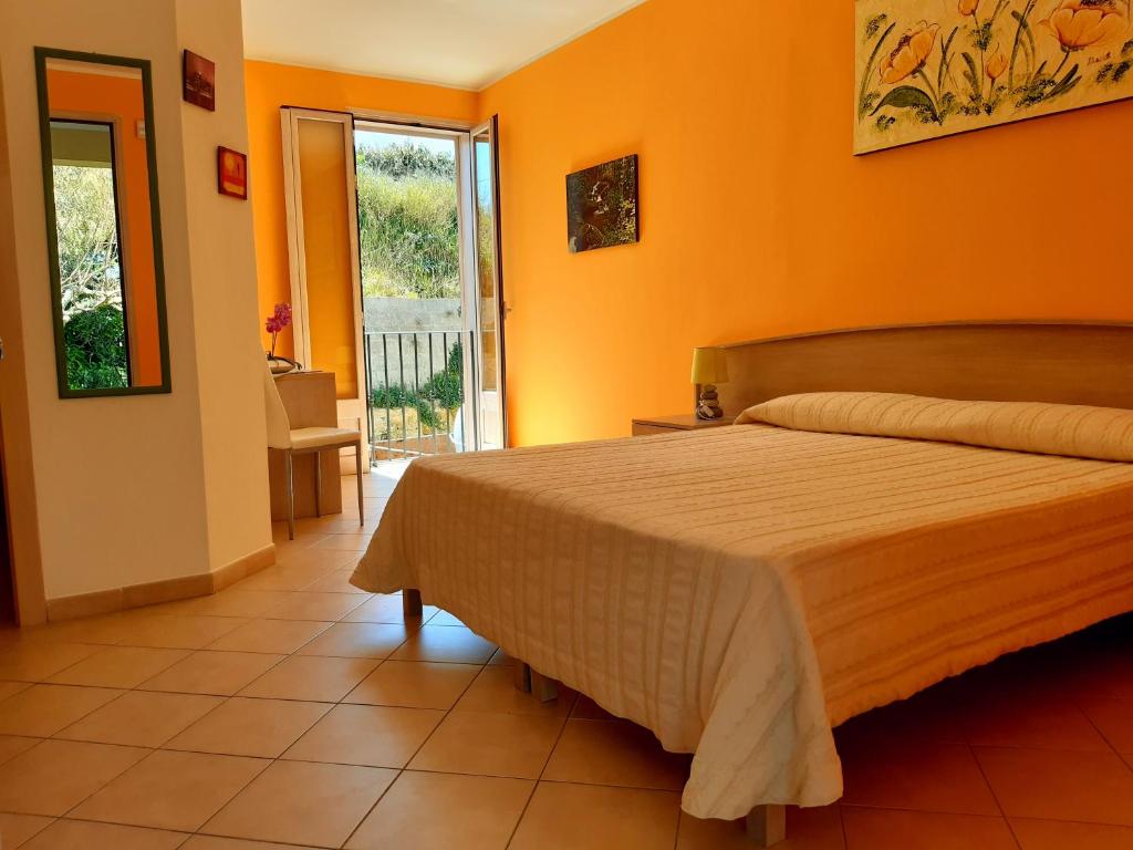 Postel nebo postele na pokoji v ubytování B&B Borgo Minerva