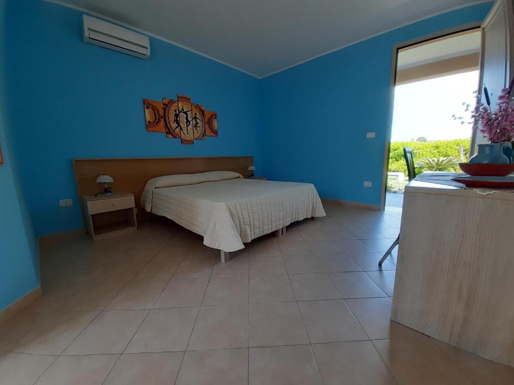 Postel nebo postele na pokoji v ubytování B&B Borgo Minerva