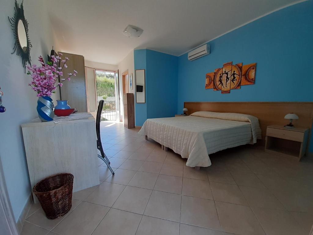 Postel nebo postele na pokoji v ubytování B&B Borgo Minerva