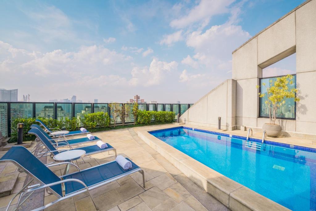 a swimming pool on the roof of a building at Blue Tree Premium Morumbi in Sao Paulo