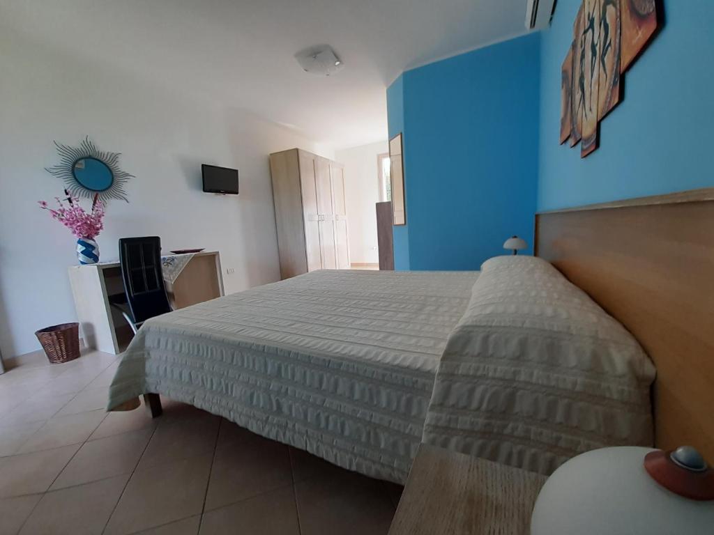 Postel nebo postele na pokoji v ubytování B&B Borgo Minerva
