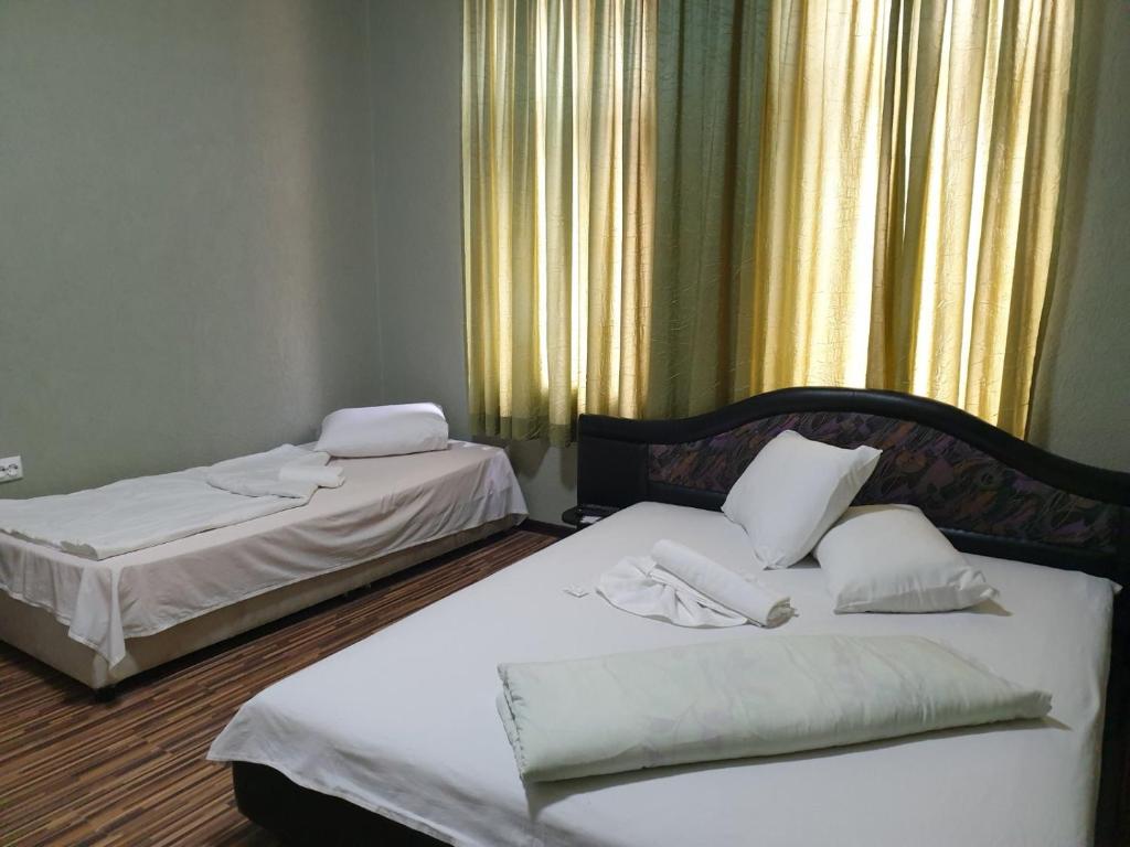 Postel nebo postele na pokoji v ubytování KM!Sofia - Стаи за гости