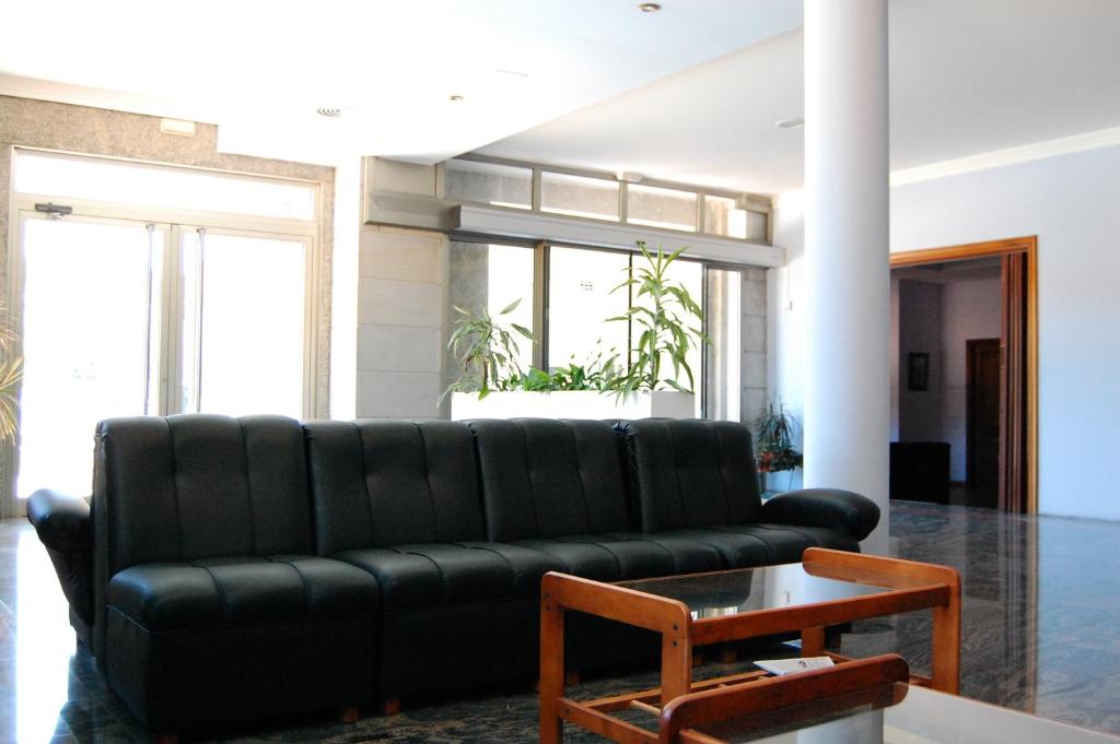Posezení v ubytování Hotel Galaico