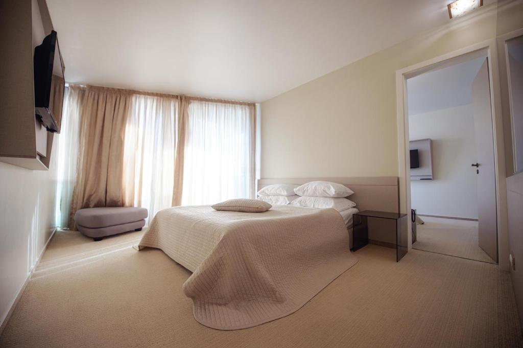 Postel nebo postele na pokoji v ubytování Hotel Turquoise All Inclusive