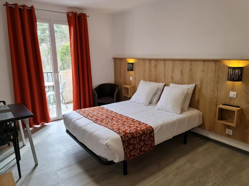 Postel nebo postele na pokoji v ubytování Le Moulin du Verdon