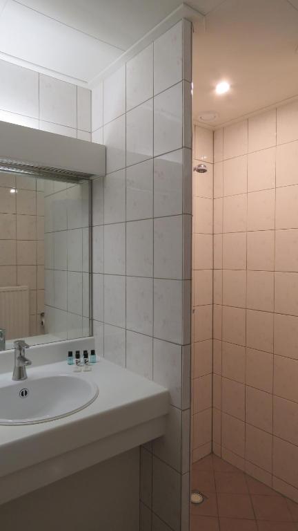 Ванная комната в Hotel Marktzicht