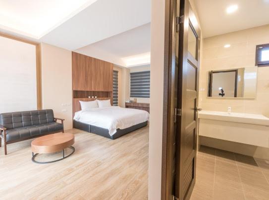 Postel nebo postele na pokoji v ubytování Yujing B&B 2