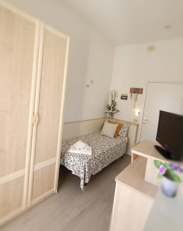 TV a/nebo společenská místnost v ubytování Hotel Cristoforo Colombo