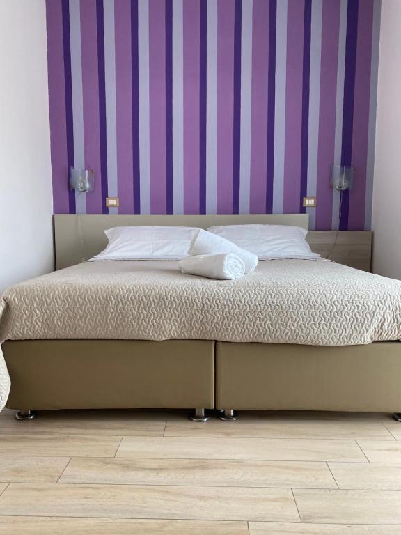 Postel nebo postele na pokoji v ubytování Sorrento Inn Lodge