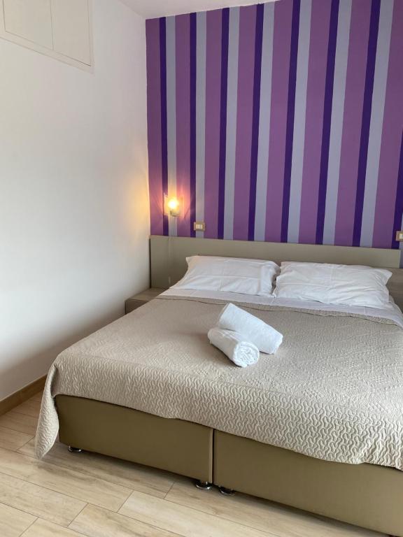 Postel nebo postele na pokoji v ubytování Sorrento Inn Lodge
