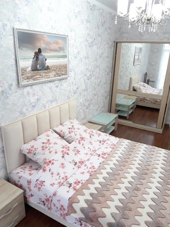 Llit o llits en una habitació de Райский приют у моря