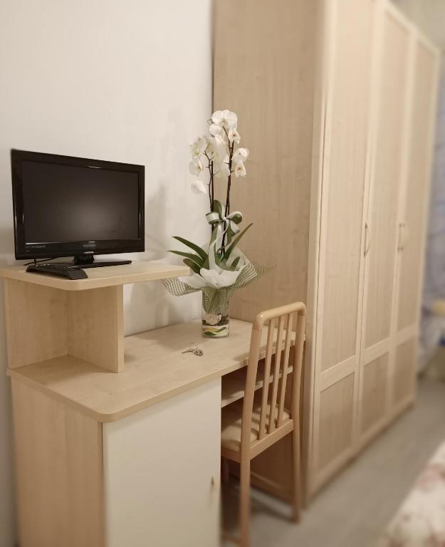 TV a/nebo společenská místnost v ubytování Hotel Cristoforo Colombo