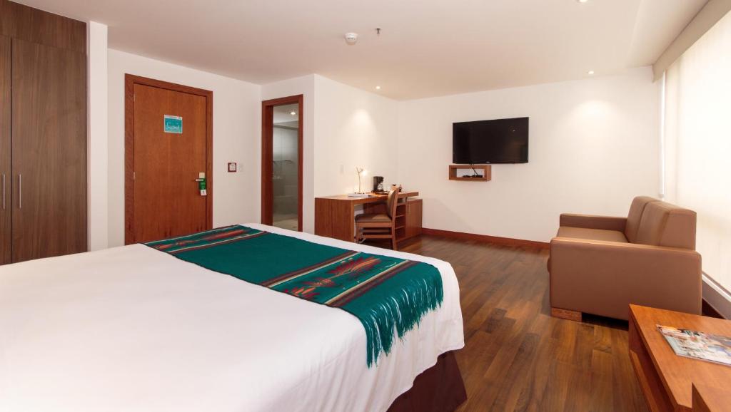 TV a/nebo společenská místnost v ubytování ZEN Hotel