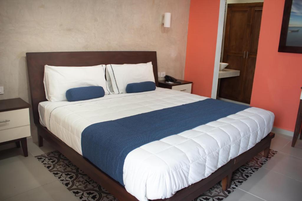 Postel nebo postele na pokoji v ubytování Hotel Las Monjas