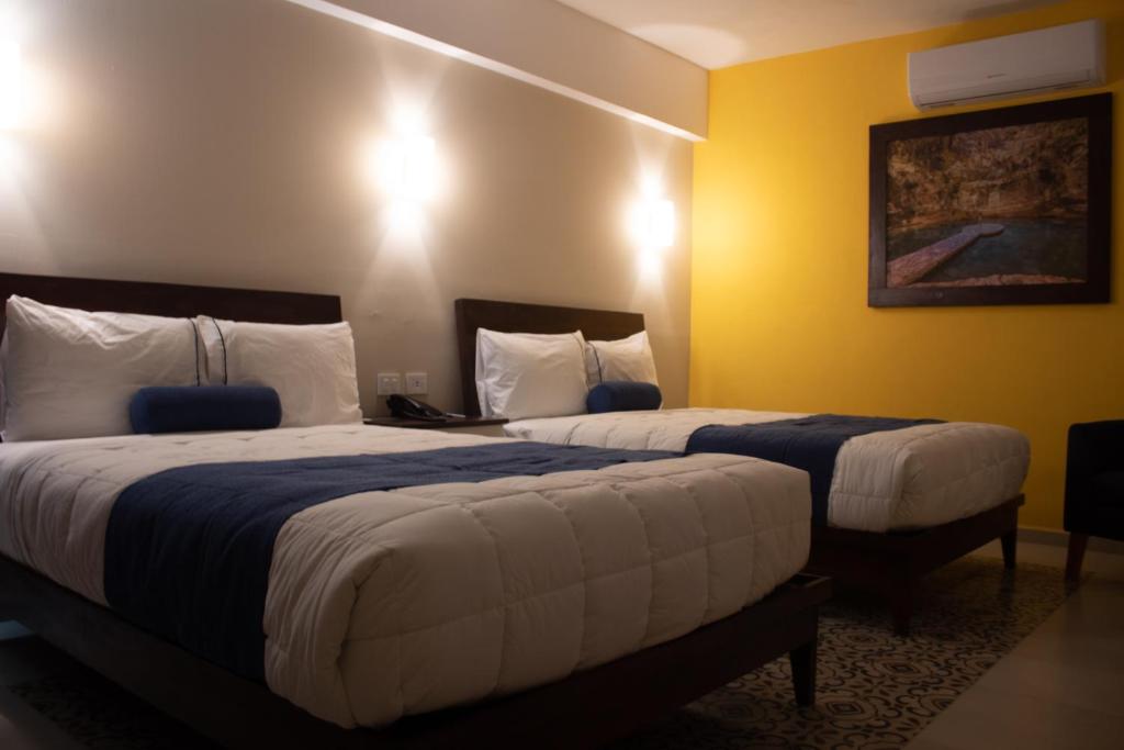 Postel nebo postele na pokoji v ubytování Hotel Las Monjas