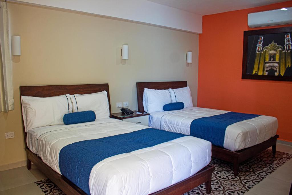 Postel nebo postele na pokoji v ubytování Hotel Las Monjas