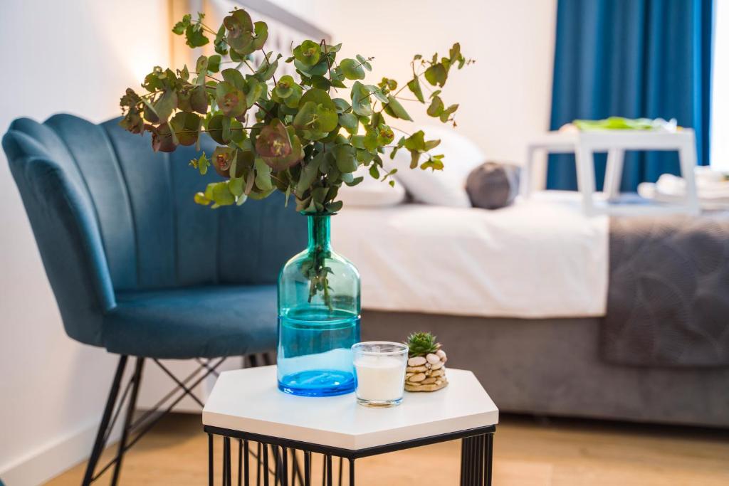 Posteľ alebo postele v izbe v ubytovaní RC Apartment