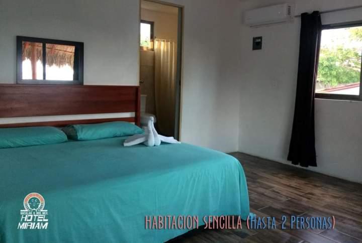 Postel nebo postele na pokoji v ubytování Hotel Miriam Bacalar