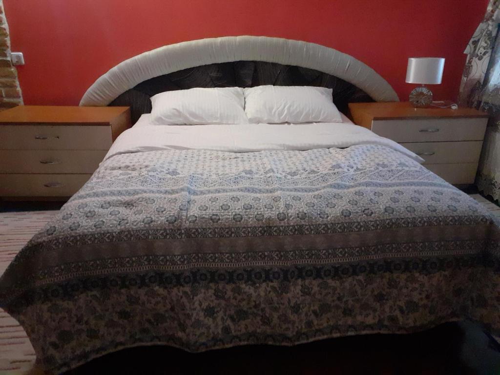 En eller flere senge i et værelse på Apartament central