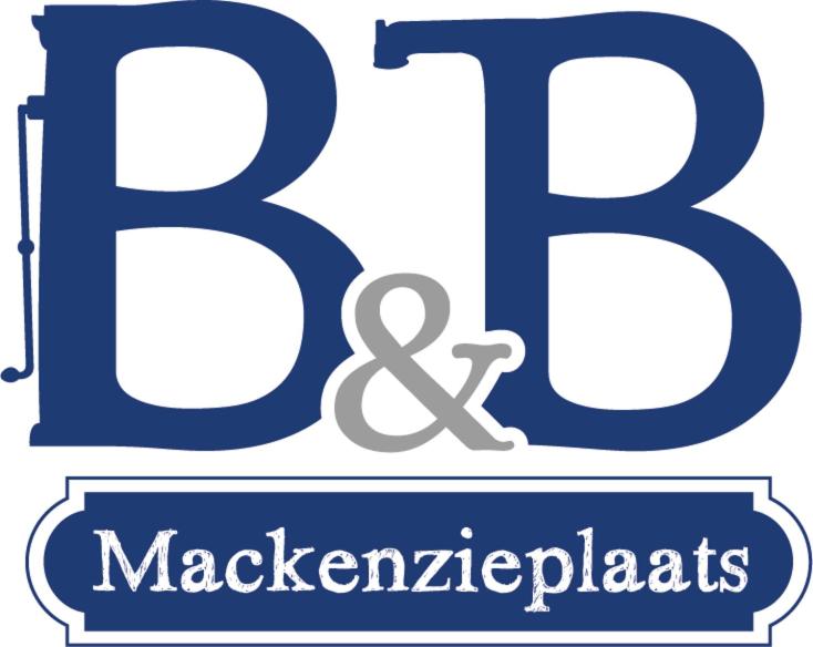een blauw logo met een anker en een lint bij B&B Mackenzieplaats in Wilp