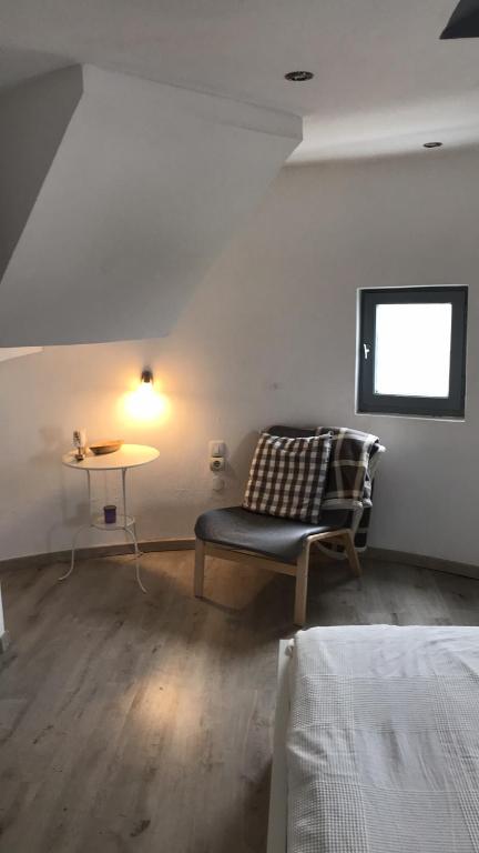 Postel nebo postele na pokoji v ubytování Anemos Windmill
