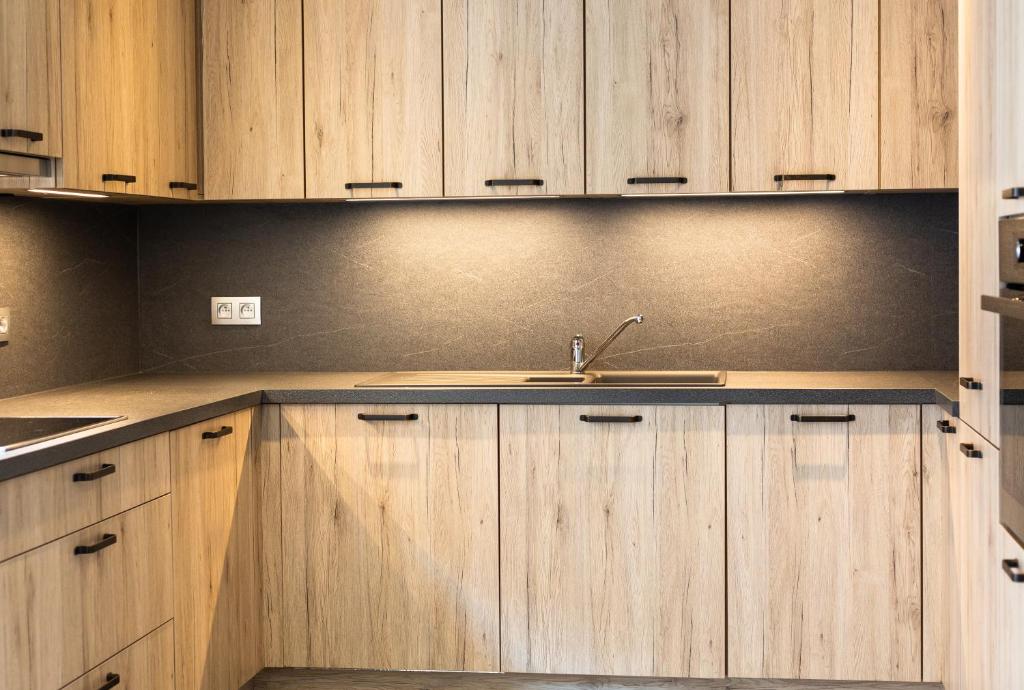 Kuchyň nebo kuchyňský kout v ubytování Maison Jean