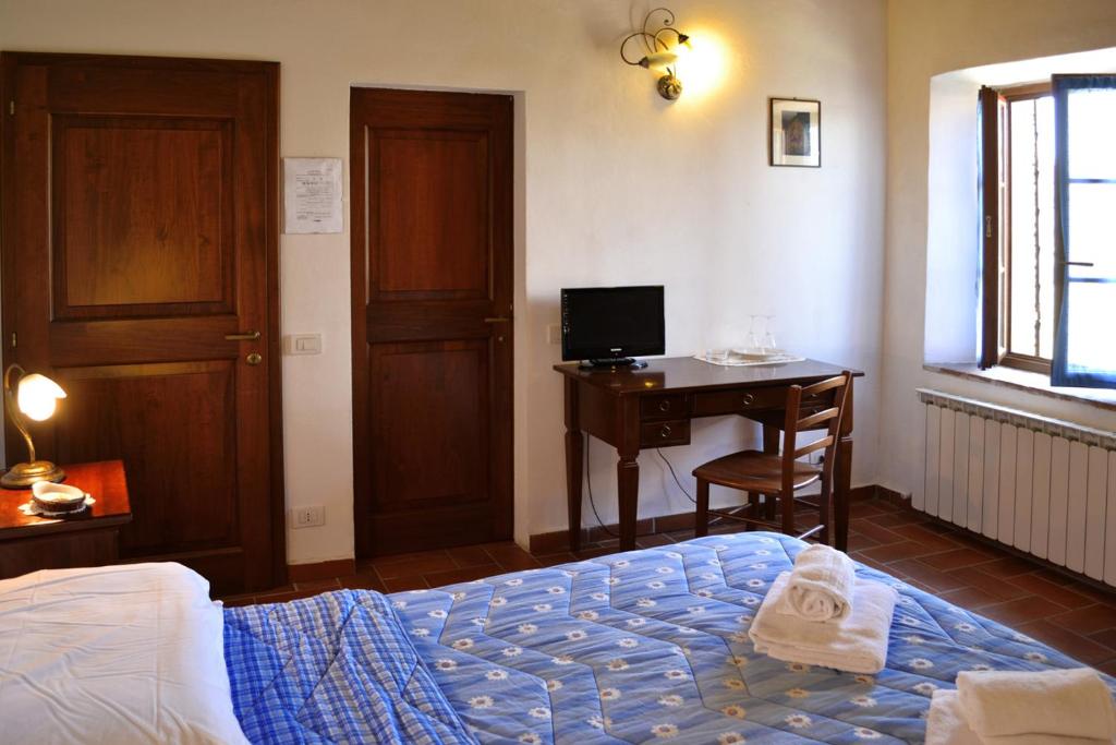 Postel nebo postele na pokoji v ubytování Casalgallo