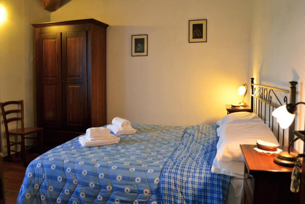 Postel nebo postele na pokoji v ubytování Casalgallo