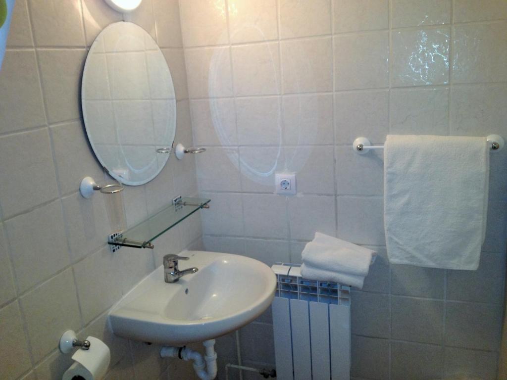 Koupelna v ubytování Hostal Alce