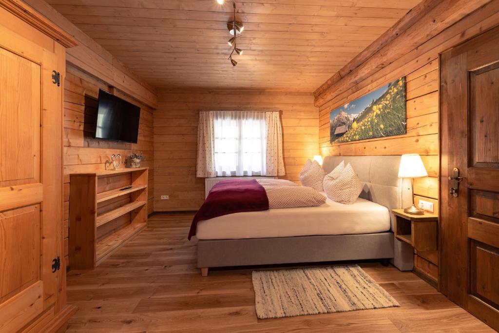 Postel nebo postele na pokoji v ubytování Biochalet Märkl