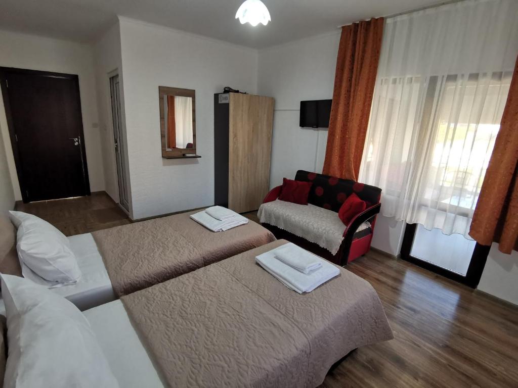 Postel nebo postele na pokoji v ubytování Hotel My House