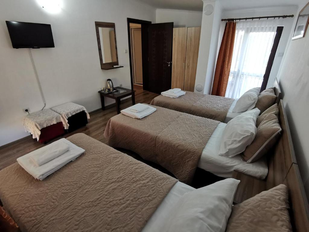 Postel nebo postele na pokoji v ubytování Hotel My House