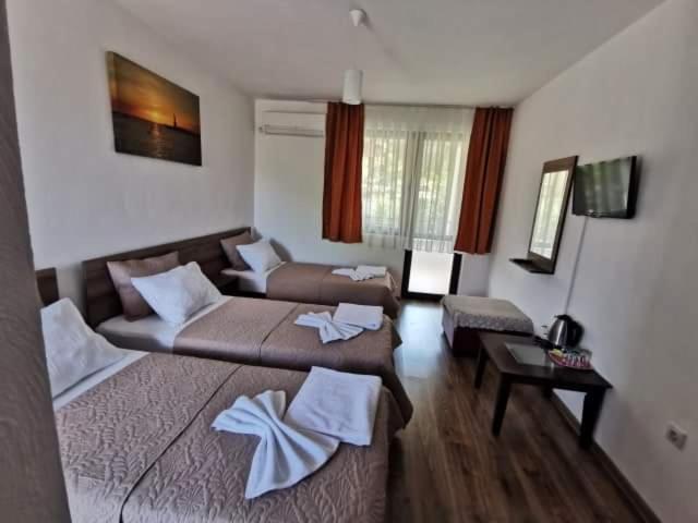 Postel nebo postele na pokoji v ubytování Hotel My House