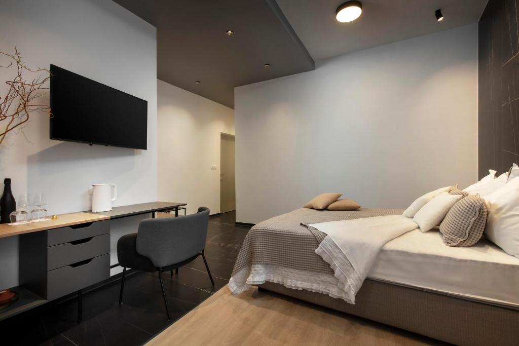 TV a/nebo společenská místnost v ubytování Aborda Rooms