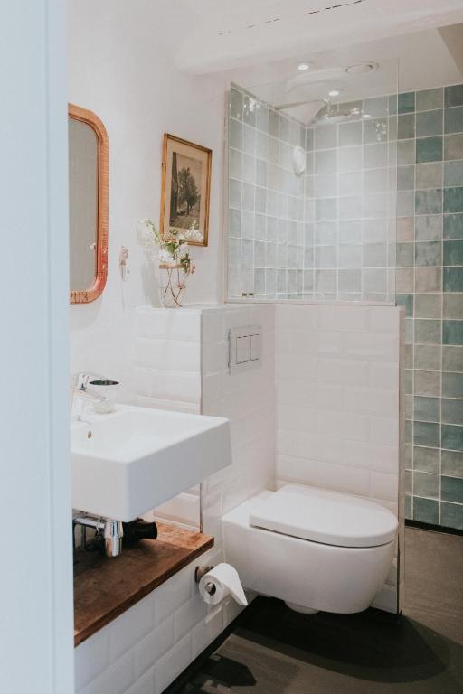 Koupelna v ubytování Hotel På Torvet