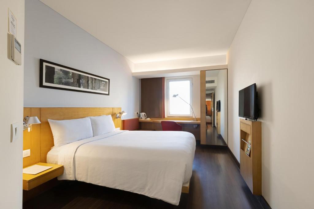 Voodi või voodid majutusasutuse ibis Gurgaon Golf Course Road - An Accor Brand toas