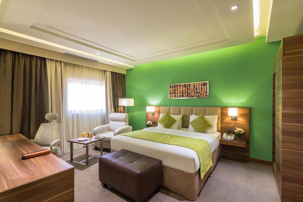 Postel nebo postele na pokoji v ubytování Mena Hotel Tabuk