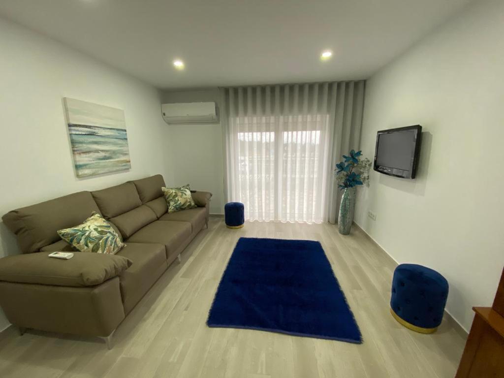 Χώρος καθιστικού στο Gina House