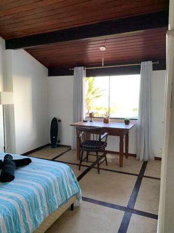  Casa de luxo em frente à praia de Itaúna