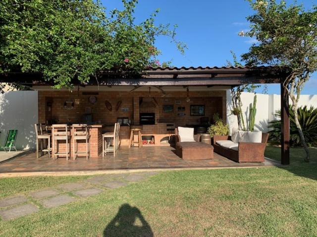  Casa de luxo em frente à praia de Itaúna