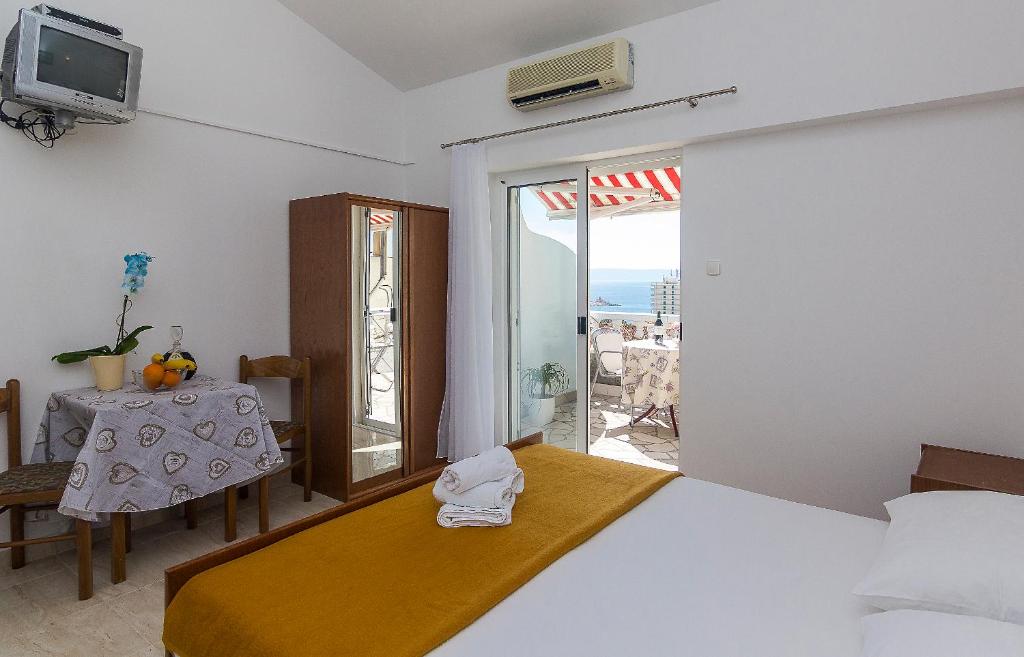 Postel nebo postele na pokoji v ubytování Apartments Erceg