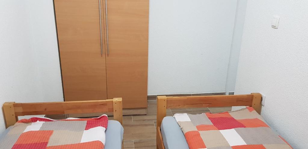 Voodi või voodid majutusasutuse Apartman za dvoje toas