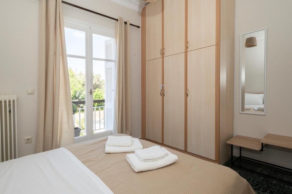 Postel nebo postele na pokoji v ubytování Navarino Apartment