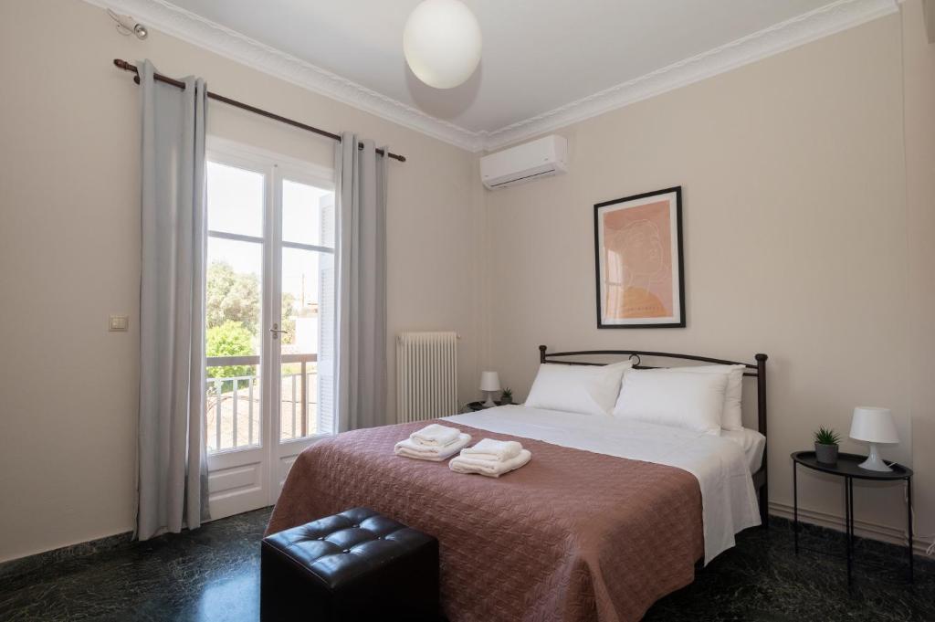 Postel nebo postele na pokoji v ubytování Navarino Apartment