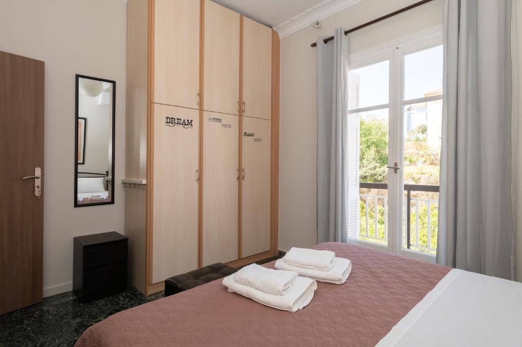 Postel nebo postele na pokoji v ubytování Navarino Apartment