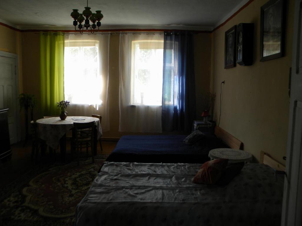 Postel nebo postele na pokoji v ubytování Miejsce Mocy Mazury